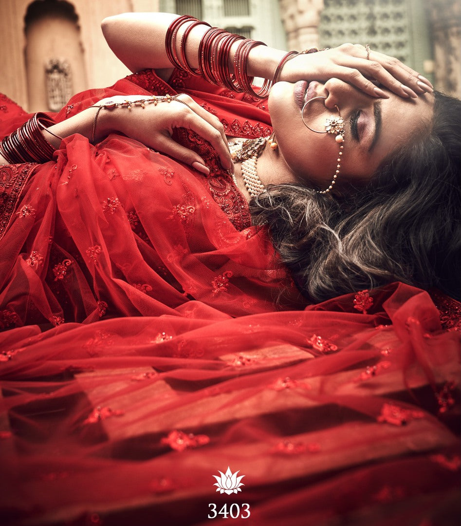Red soft net thread work bridal heavy lehenga choli