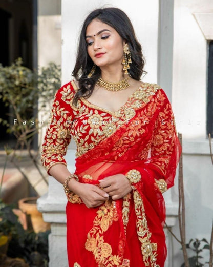 Red soft net thread work saree