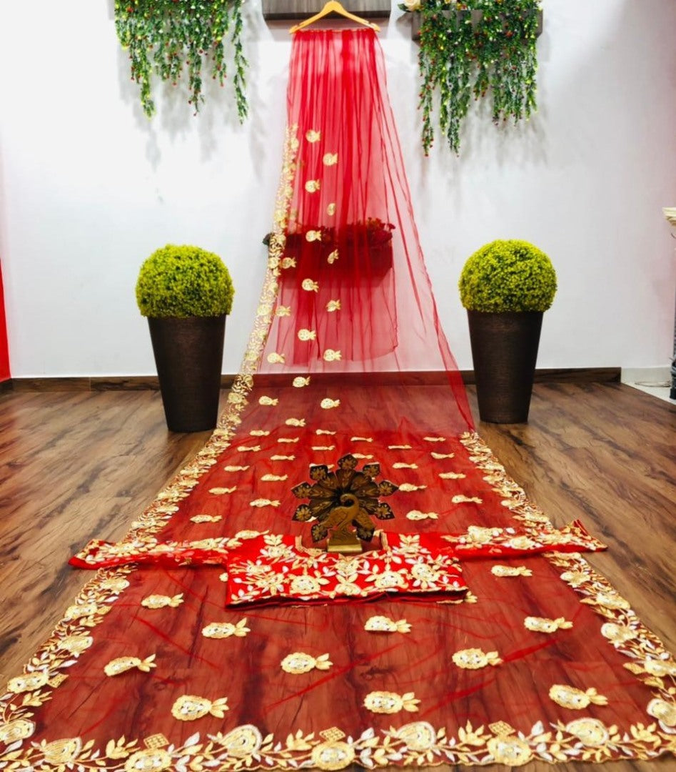 Red soft net thread work saree