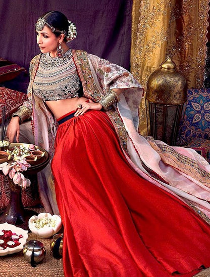 Red soft taffeta silk heavy embroidered lehenga with shrug