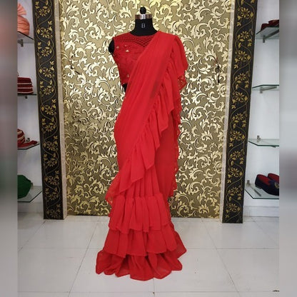 Red Stylist partywear ruffle saree with net embroidered blouse