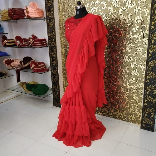 Red Stylist partywear ruffle saree with net embroidered blouse