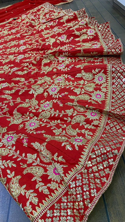 Red tapeta silk heavy sequence and thread embroidered wedding lehenga choli
