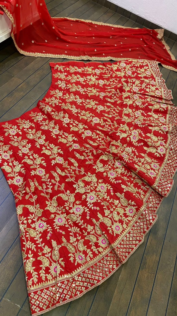 Red tapeta silk heavy sequence and thread embroidered wedding lehenga choli