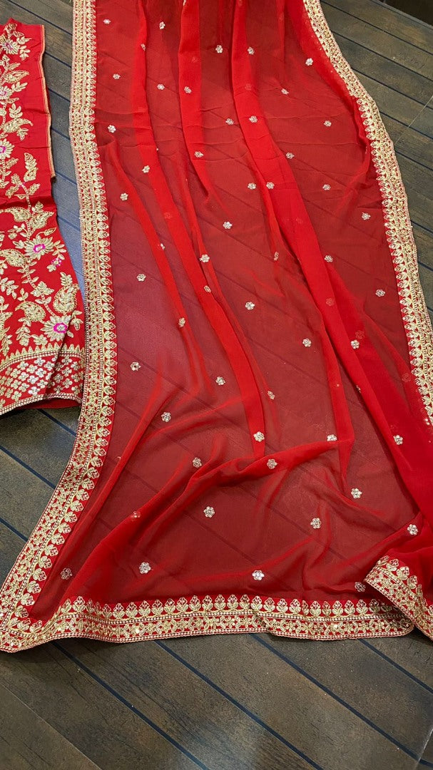 Red tapeta silk heavy sequence and thread embroidered wedding lehenga choli