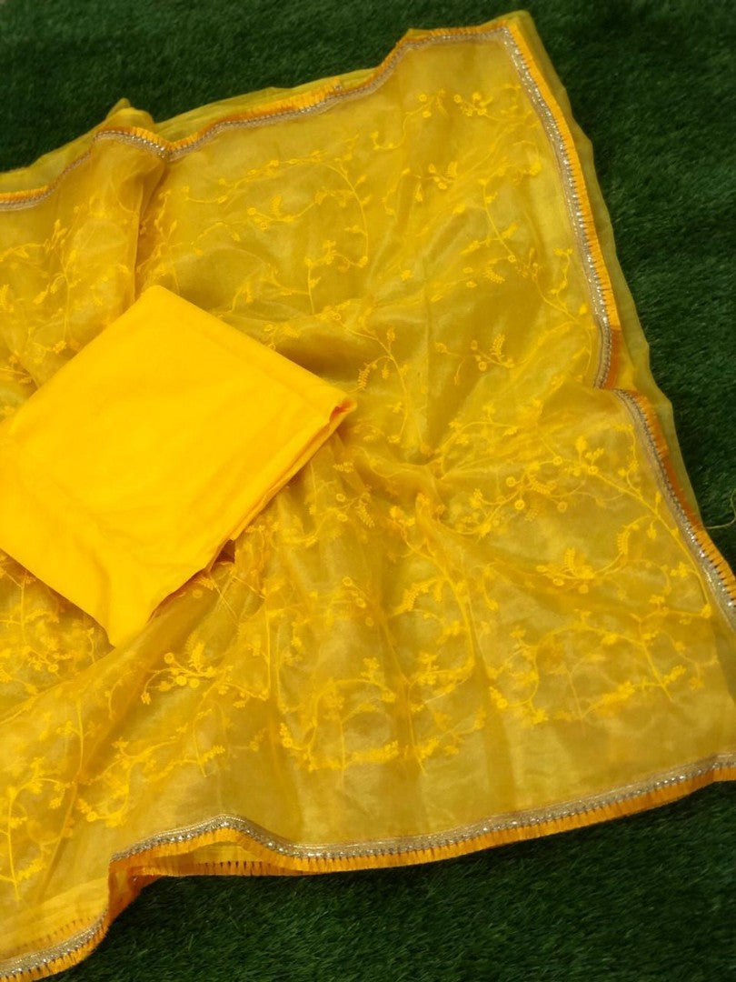 red tissue net embroidered bollywood partywear saree