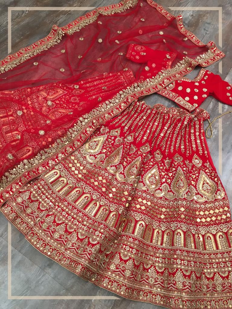 Red velvet heavy embroidered bridal lehenga choli