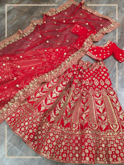 Red velvet heavy embroidered bridal lehenga choli