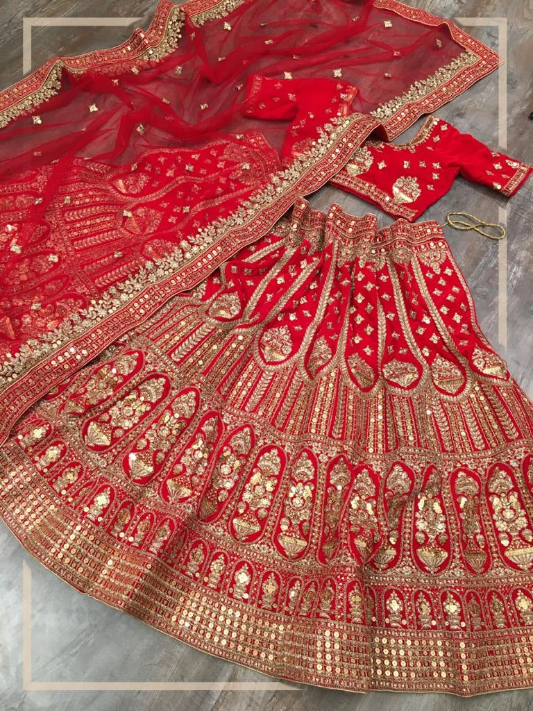 Red velvet heavy embroidered bridal lehenga choli