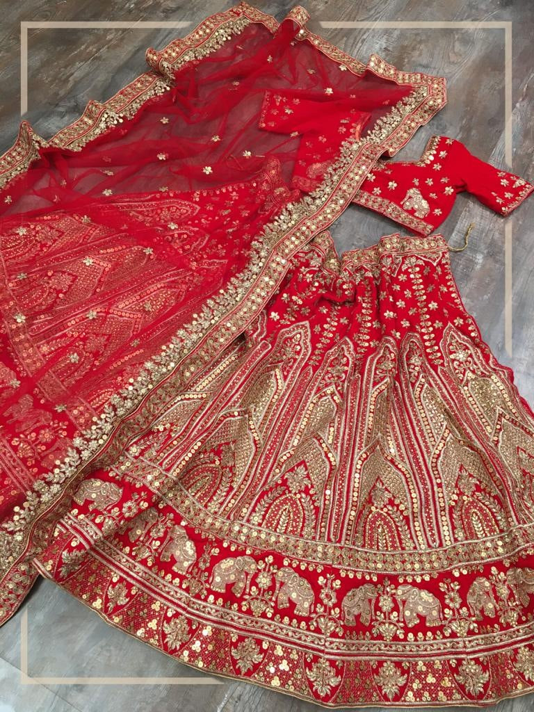 Red velvet heavy embroidered bridal lehenga choli