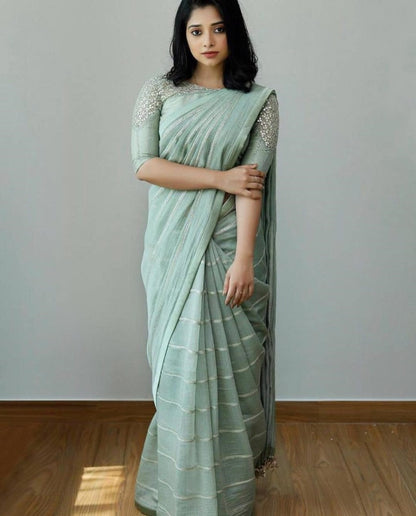 Sea green dola silk sequence work saree