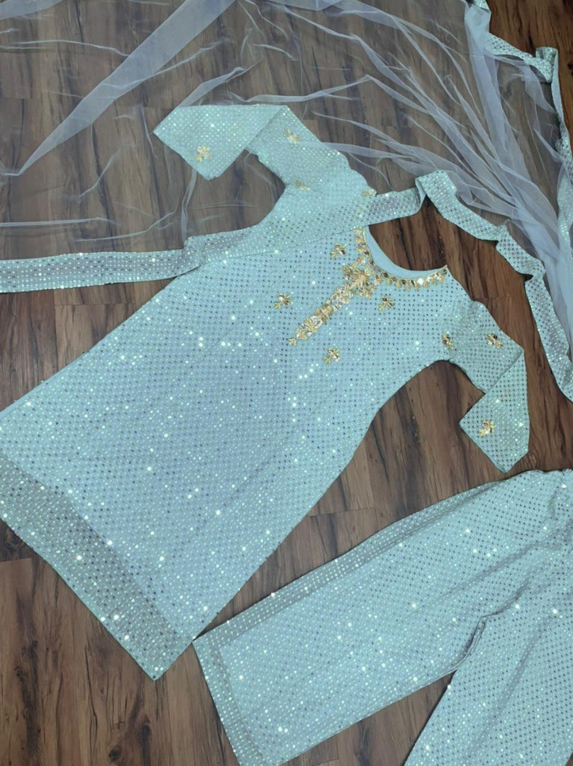 Sea green georgette embroidered with sequence work plazzo suit