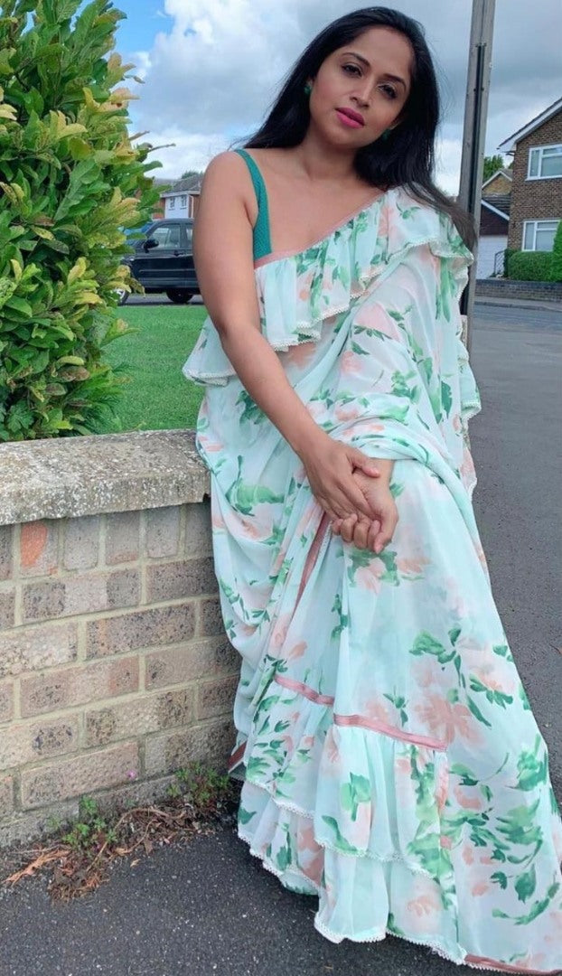 Sea green georgette floral printed ruffle saree