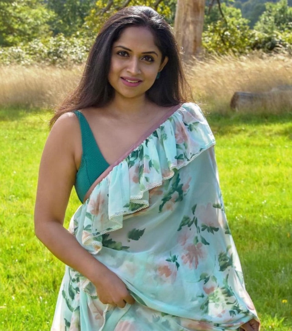 Sea green georgette floral printed ruffle saree