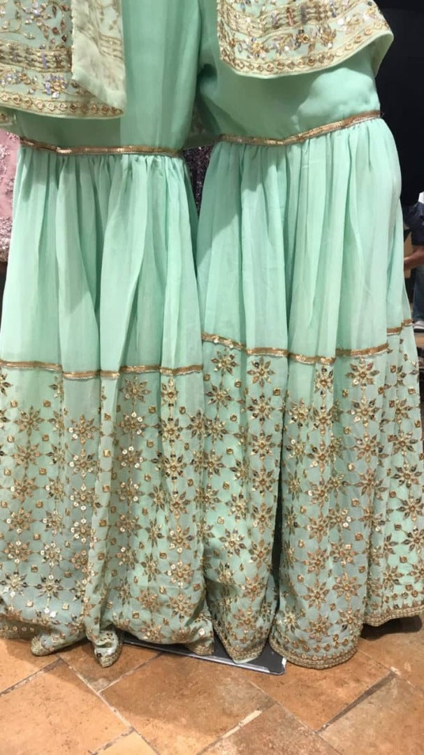 Sea green georgette heavy sequence work designer sharara suit with shrug