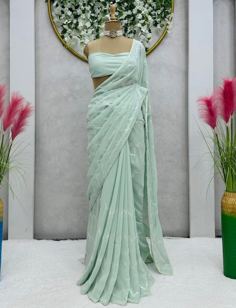 Sea green georgette heavy thread sequence work saree