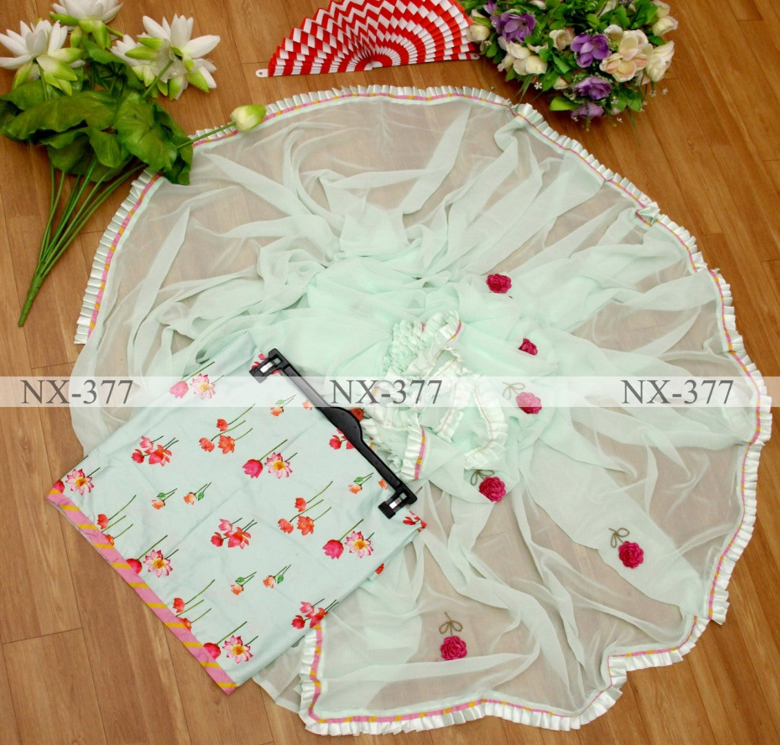 Sea green georgette ruffle layer saree