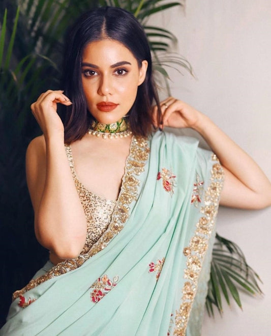 Sea green georgette thread and zari worked designer saree