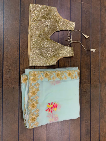 Sea green georgette thread and zari worked designer saree