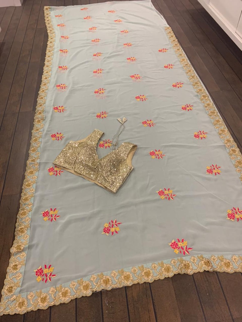 Sea green georgette thread and zari worked designer saree