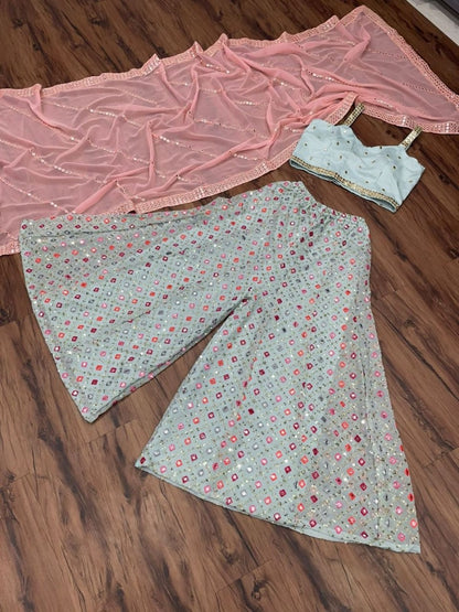 Sea green heavy embroidered plazzo suit