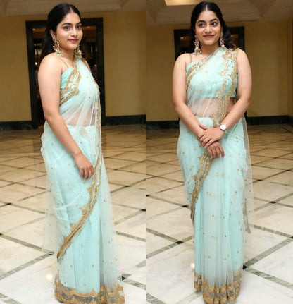 Sea green net embroidered saree