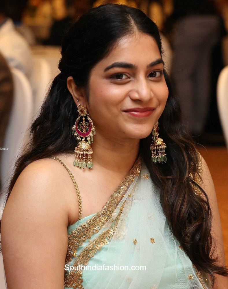 Sea green net embroidered saree