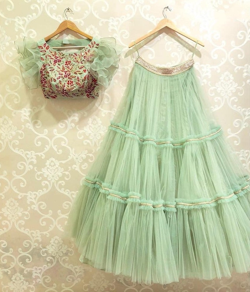 sea green net fabulous ceremonial lehenga with embroidered blouse