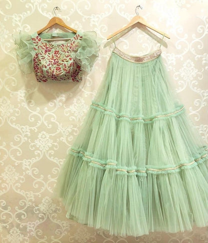 sea green net fabulous ceremonial lehenga with embroidered blouse