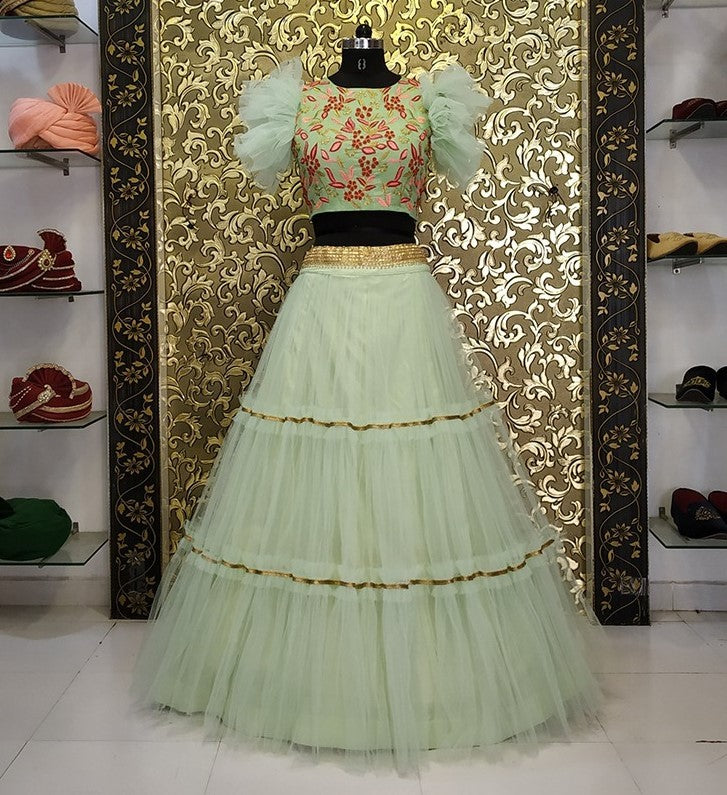 sea green net fabulous ceremonial lehenga with embroidered blouse