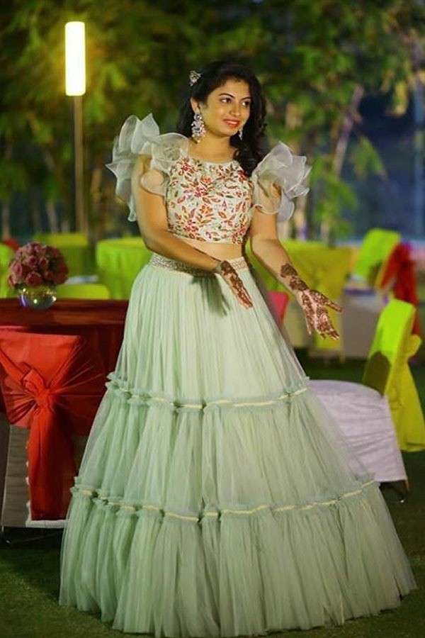 sea green net fabulous ceremonial lehenga with embroidered blouse
