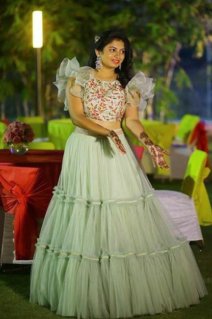 sea green net fabulous ceremonial lehenga with embroidered blouse