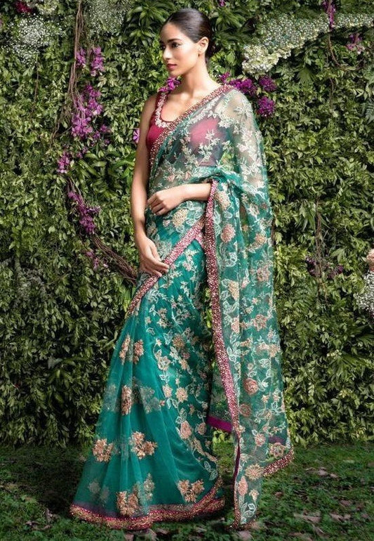 Sea green net heavy embroidered wedding saree