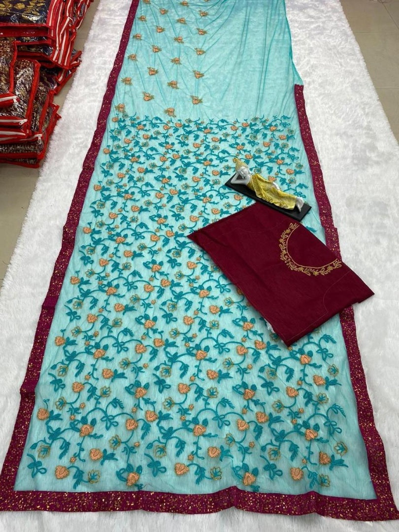 Sea green net heavy embroidered wedding saree