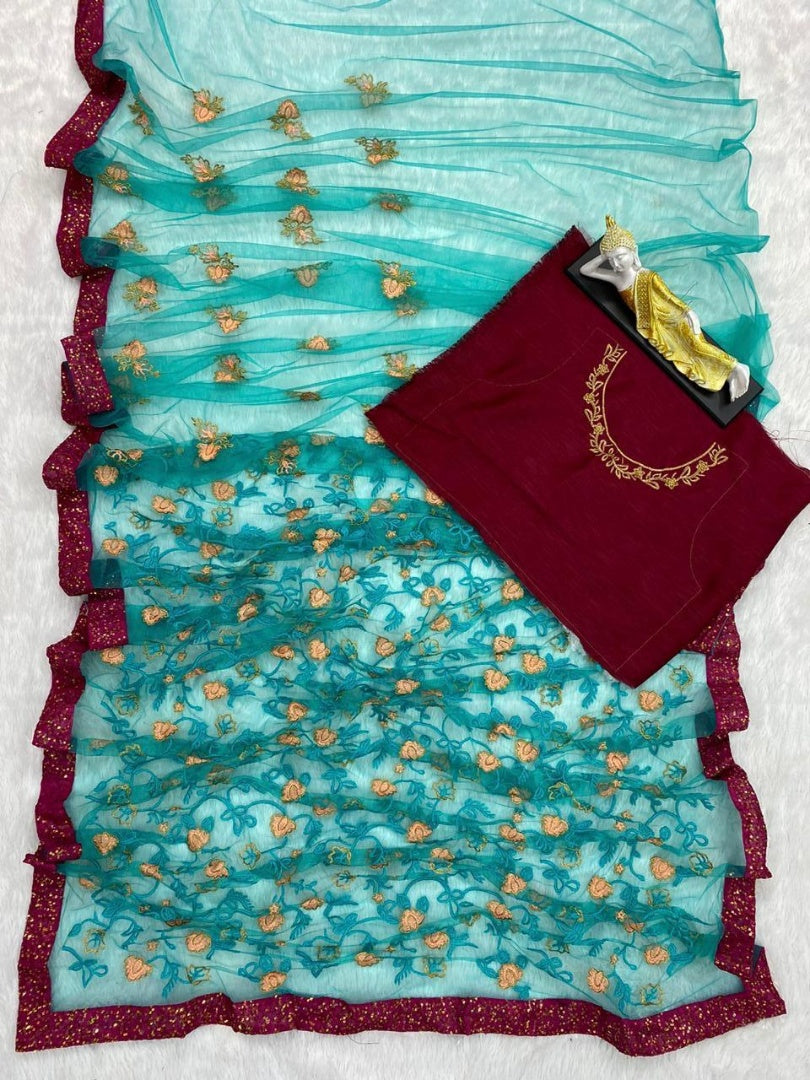Sea green net heavy embroidered wedding saree