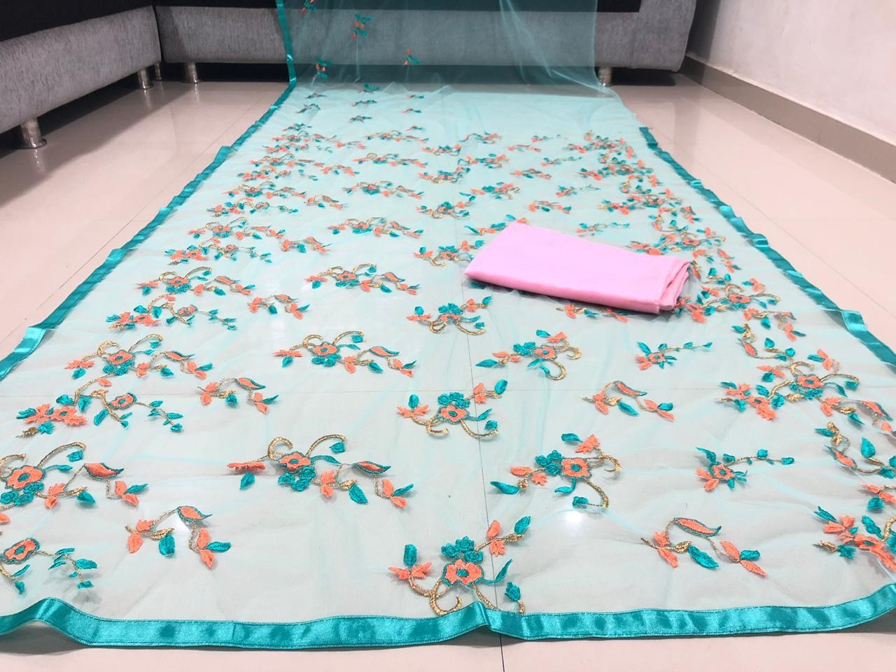 Sea green net heavy floral embroidered stylist saree