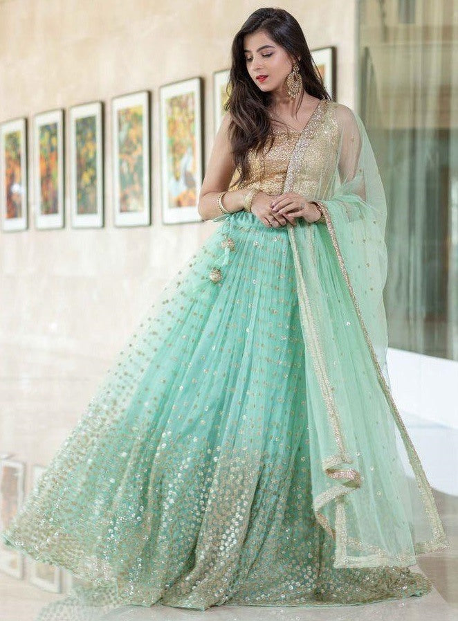 Sea green net heavy sequence work wedding lehenga choli