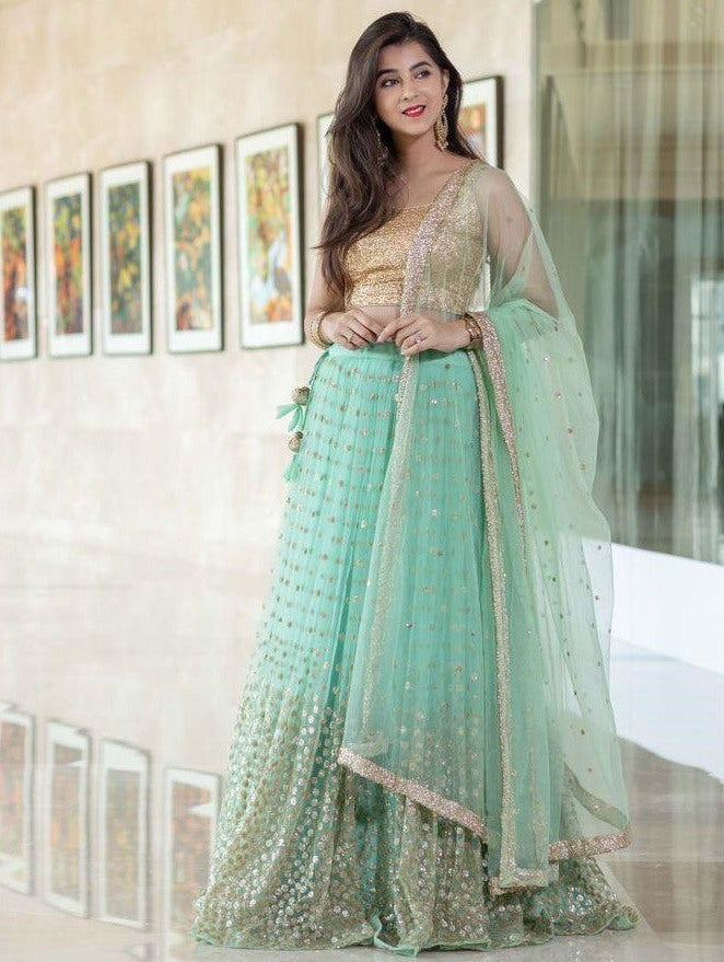 Sea green net heavy sequence work wedding lehenga choli