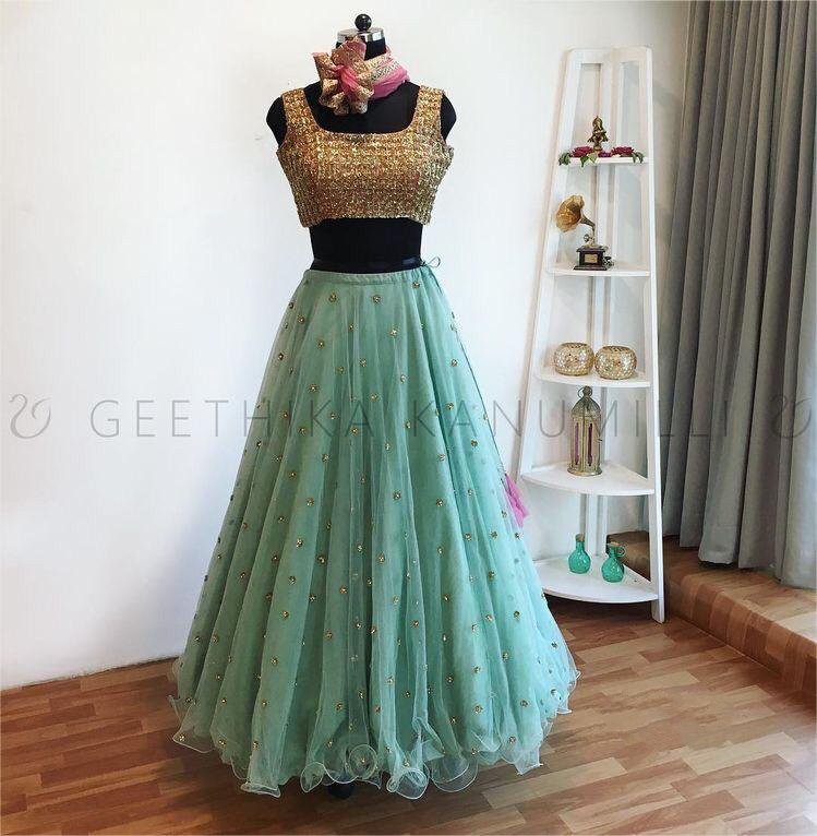 sea green net partywear lehenga