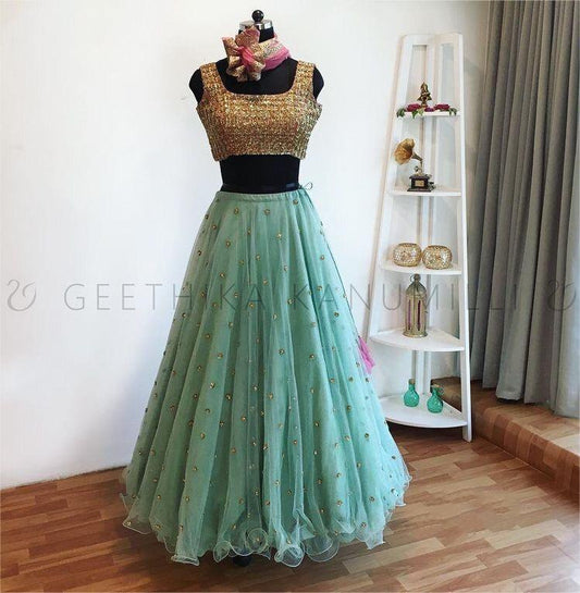 sea green net partywear lehenga