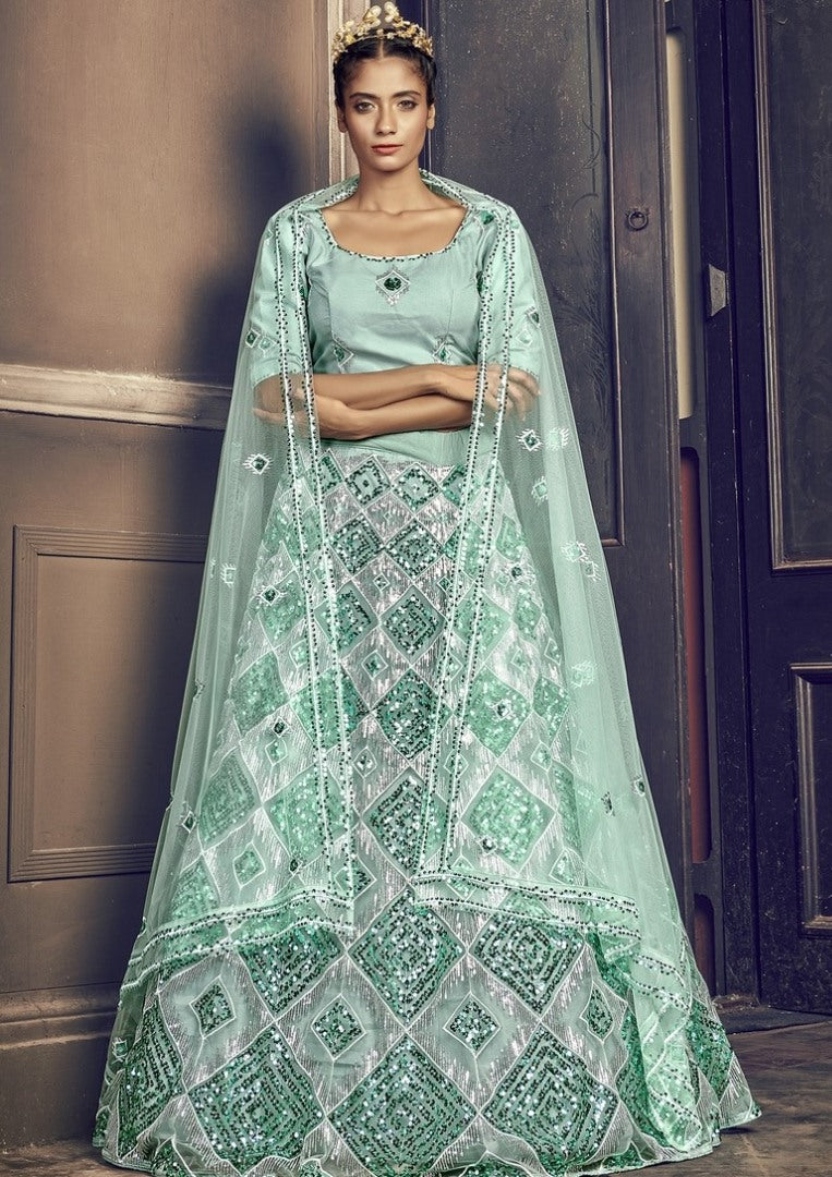 Sea green net sequence embroidered work party wear lehenga choli