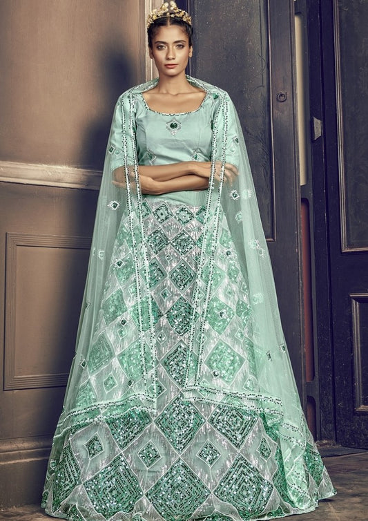 Sea green net sequence embroidered work party wear lehenga choli