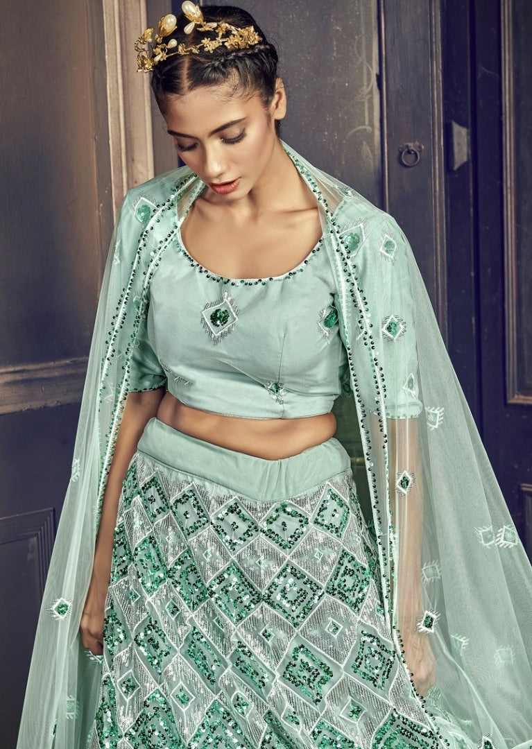 Sea green net sequence embroidered work party wear lehenga choli