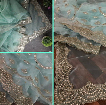 Sea green organza embroidered sequence work saree