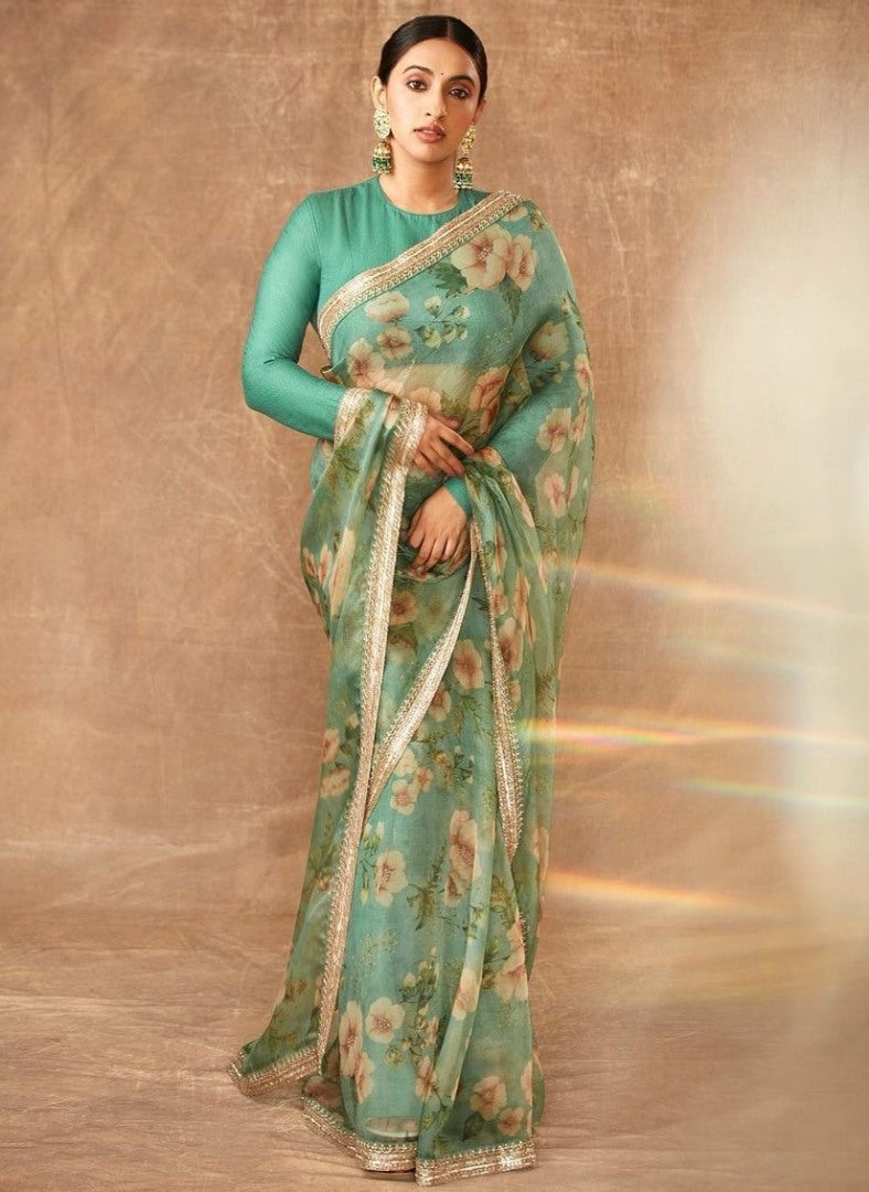 Sea green organza flower printed embroidered border saree