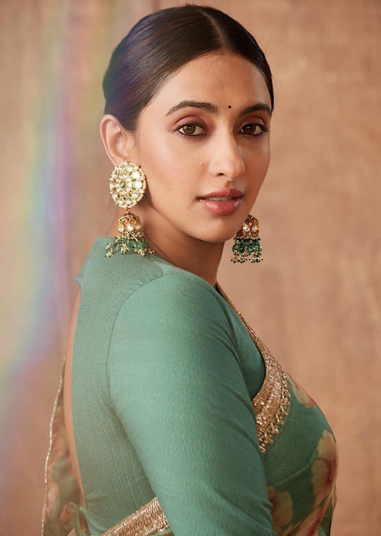 Sea green organza flower printed embroidered border saree