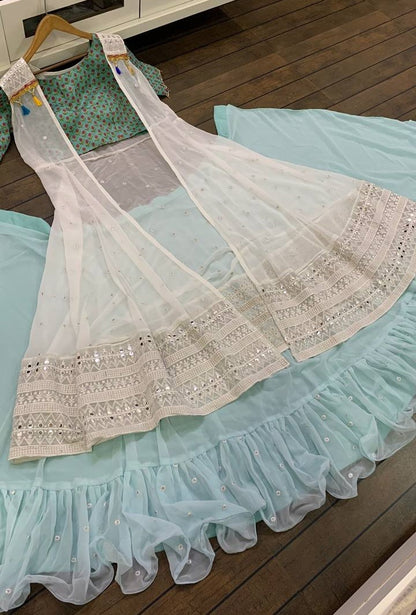 Sea green ruffle border indowestern lehenga with white embroidered shrug
