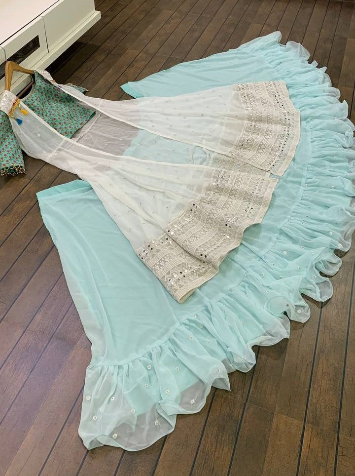 Sea green ruffle border indowestern lehenga with white embroidered shrug