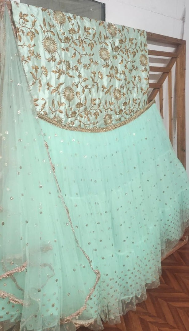 Sea green soft net embroidered wedding lehenga choli
