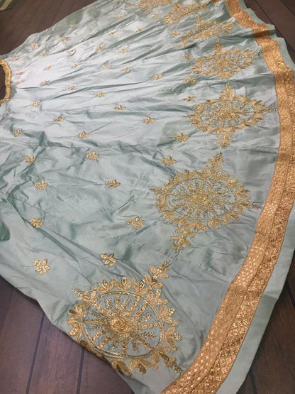 sea green tapeta silk designer embroidered ceremonial lehenga choli